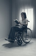 Foto: Young woman reading a book Young woman reading a book
