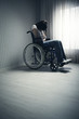 Foto: Crying woman sitting in wheelchair Crying woman sitting in wheelchair