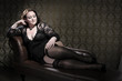 Photo: Black lace on chesterfield sofa Black lace on chesterfield sofa