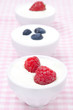 Photo: yogurt with different fresh berries in bowls yogurt with different fresh berries in bowls