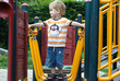 boy or kid playing  on playground.