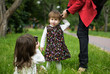 mother with two children summer outdoors