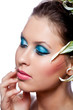 Beautiful female eyes with bright blue make-up