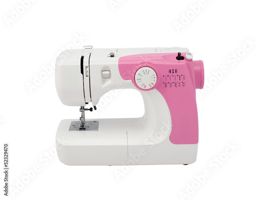 Photo: A cute sewing machine isolated on white background A cute sewing machine isolated on white background