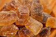 brown caramelized sugar on wooden background
