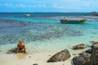 Photo: Woman sun bathing in Pigeon island Woman sun bathing in Pigeon island