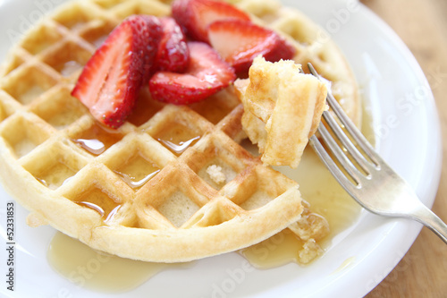 Photo: freshly-made waffle with strawberries freshly-made waffle with strawberries