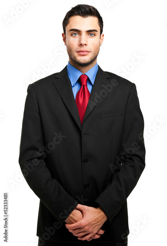 Photo: Young businessman isolated on white Young businessman isolated on white