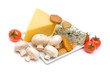 cheese, mushrooms and tomatoes isolated on white background