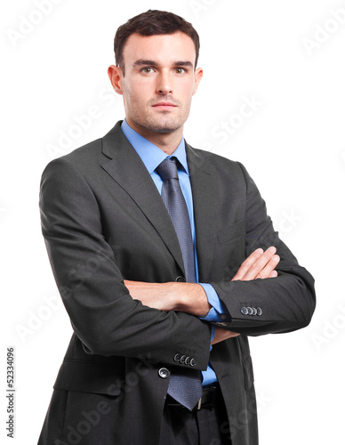 Photo: Young businessman isolated on white Young businessman isolated on white