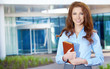Young happy women or student on the property business background