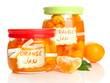 Orange jam with zest and tangerines, isolated on white