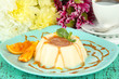 Panna Cotta with orange zest and caramel sauce,