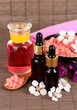 Spa composition with aroma oils on table close-up
