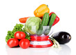 Fresh vegetables in scales isolated on white