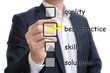 Man ticking the best practice checkbox