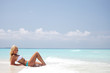 Photo: woman on the sand the ocean coast woman on the sand the ocean coast
