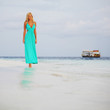 Photo: woman on the ocean coast woman on the ocean coast