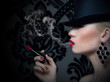 Pretty blonde girl with cigarette and red lips