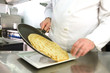 Chef hands serving pancake