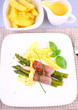 Green asparagus with ham, potato, basil and sauce