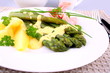 Green asparagus with prosciutto, potato, chives and sauce