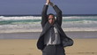 Vidéo : Excited businessman screaming by the sea, super slow motion Excited businessman screaming by the sea, super slow motion