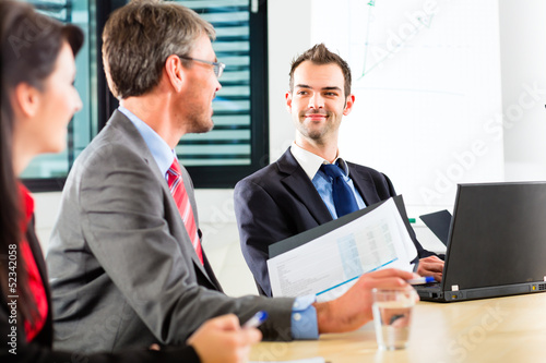 Photo: Business - businesspeople have team meeting Business - businesspeople have team meeting