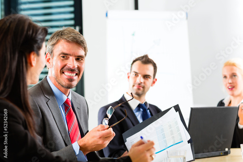 Photo: Business - businesspeople have team meeting Business - businesspeople have team meeting