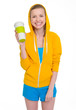 Happy teenager girl holding coffee cup
