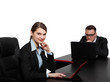 Young Business Couple on Laptops