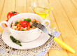 Delicious rice with vegetables and herbs in pot