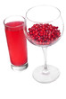 fresh grains and juice pomegranate in glass