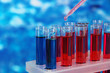Blue and red test tubes close-up