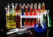 Foto: Colorful test tubes on dark background Colorful test tubes on dark background