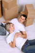Young couple moving in new house