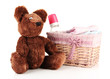 Beautiful basket of baby clothes isolated on white