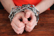 Prisoner in handcuffs close-up