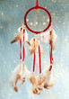 Beautiful dream catcher on blue background with lights