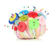 Colorful buttons and multicolor wool ball, isolated on white