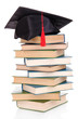 Grad hat with books isolated on white