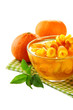 Orange jam with zest and tangerines, isolated on white