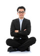 Photo: Asian business man sitting on floor Asian business man sitting on floor