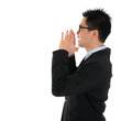 Photo: Side view Asian business man shouting Side view Asian business man shouting