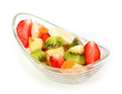 Fresh tasty fruits salad on a white background