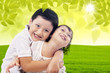 Cute brother and sister at park