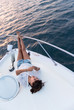 Photo: Woman relaxing on a boat Woman relaxing on a boat