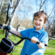 Portert boy with bicycle, outdoor