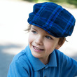 Closeup portrait of cute little boy laughing