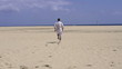 Man running on beautiful beach, super slow motion, 240fps